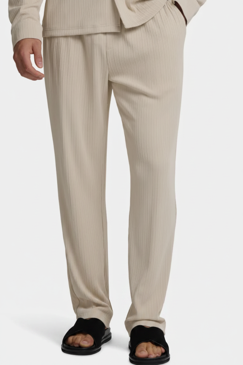 Beige textured trousers — clean background