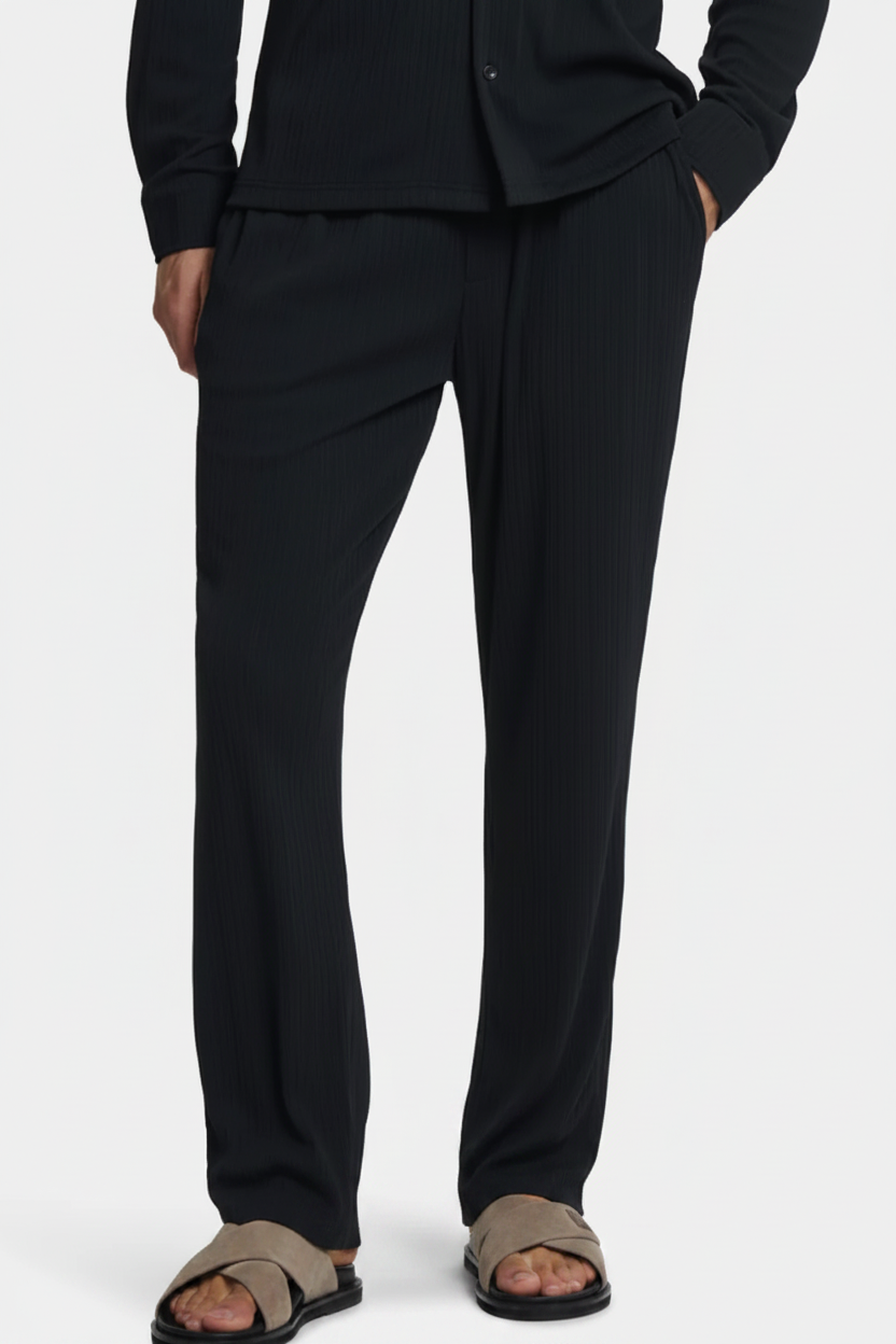 Black trousers — clean background
